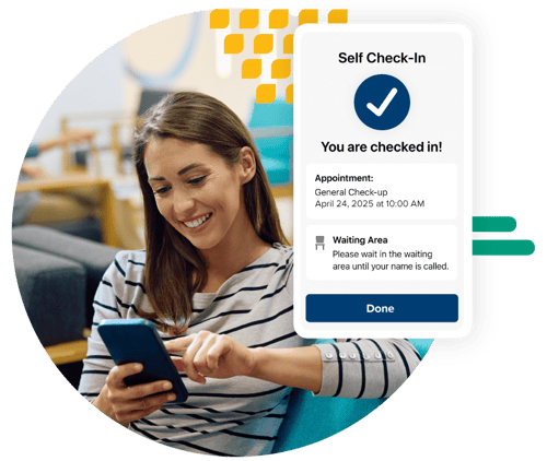 A patient checks in for her appointment through her phone while sitting in the waiting room