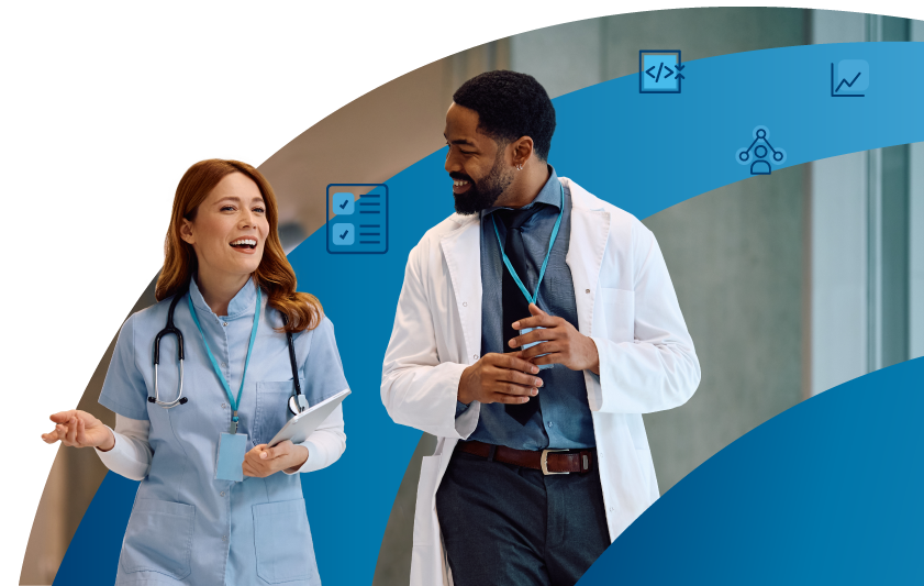 Two doctors talking and walking down a hallway Two doctors talking and walking down a hallway